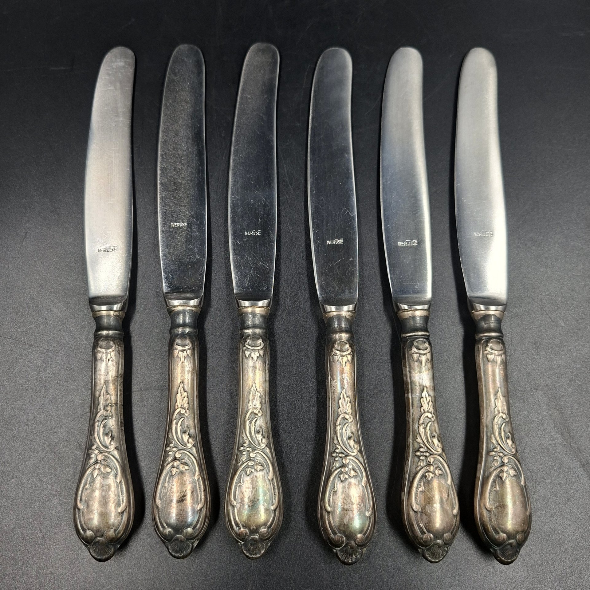 Набор из шести десертных/закусочных ножей с растительным декором, сталь, мельхиор, Латвия, 1930-1960 гг.