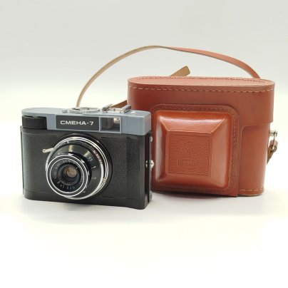 Фотоаппарат "Смена-7" в оригинальном футляре (нерабочий), металл, пластик, стекло, кожа, ЛОМО (Ленинградское оптико-механическое объединение), СССР, 1961-1971 гг.