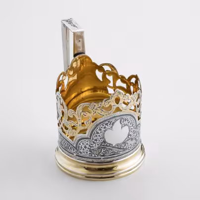 Подстаканник с растительным декором и прорезным туловом, серебро 875 пр., золочение, чернь, Кубачинский художественный комбинат, СССР, 1960-1980 гг.