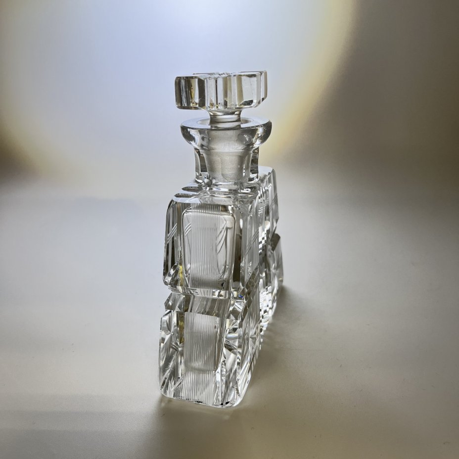 Флакон, украшенный резным декором