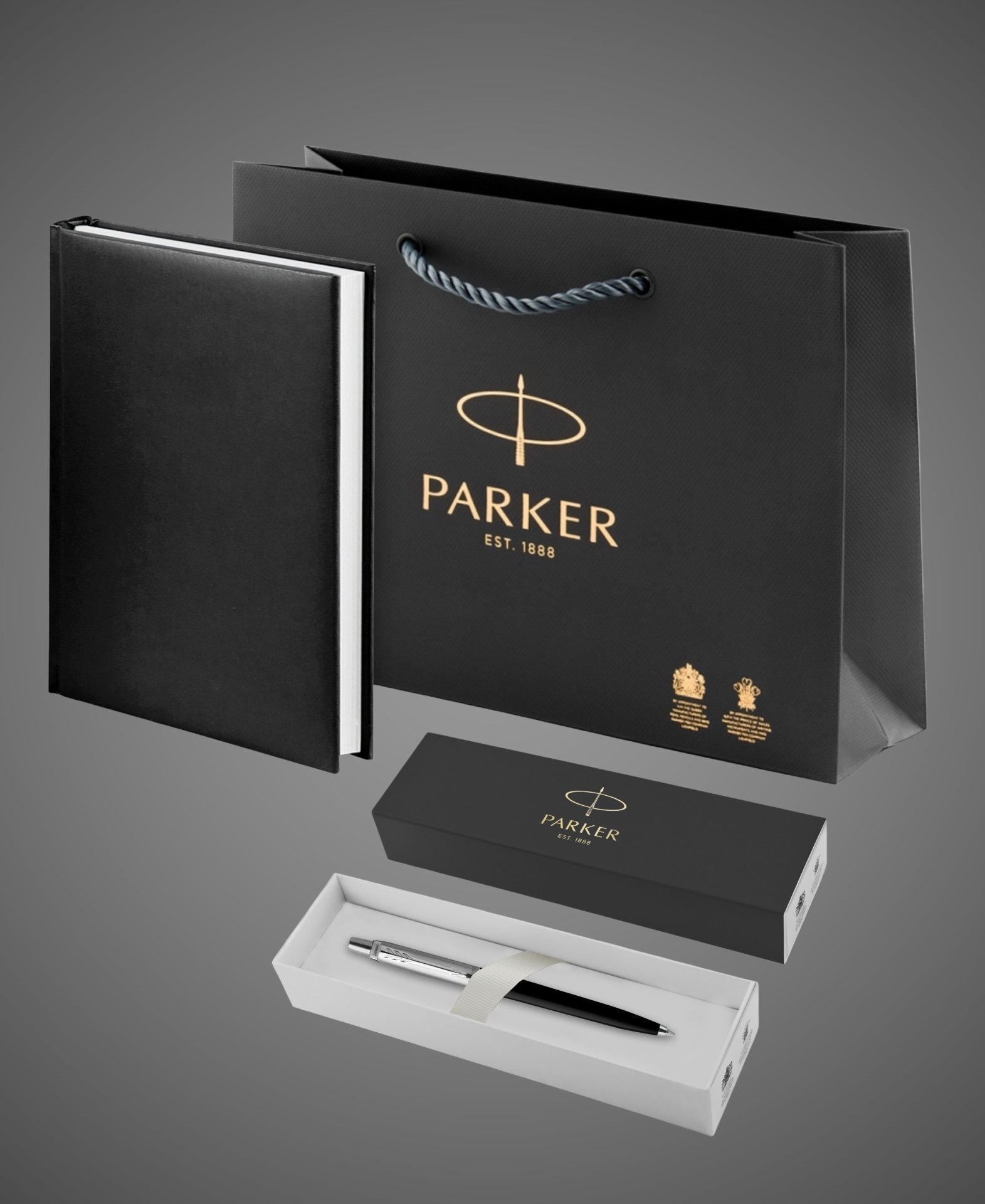 Подарочный набор: Шариковая ручка Parker Jotter K60, цвет: Black, стержень: Mblue, в подарочной упаковке и черный недатированный ежедневник, Металлы: латунь, металл, пластик