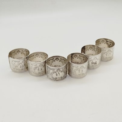Набор винтажных колец для салфеток на 6 персон, украшенных растительным декором и произвольной нумерацией, мНЦ (медь-никель-цинк), Артель «Промтехсвязь», СССР, 1950-1960 гг.