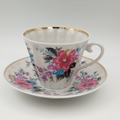 Чайная пара в подборе  (блюдце "Ситец", чашка "Март"), форма "Лучистая", автор формы Н.П. Славина
