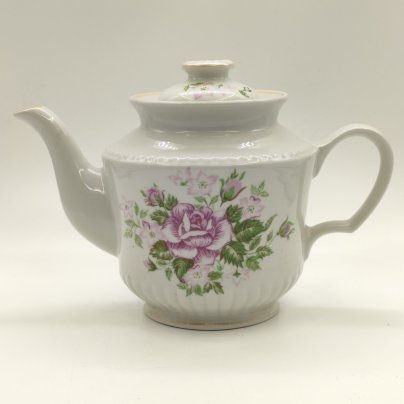 Чайник с цветочным декором и фигурной ручкой на крышке