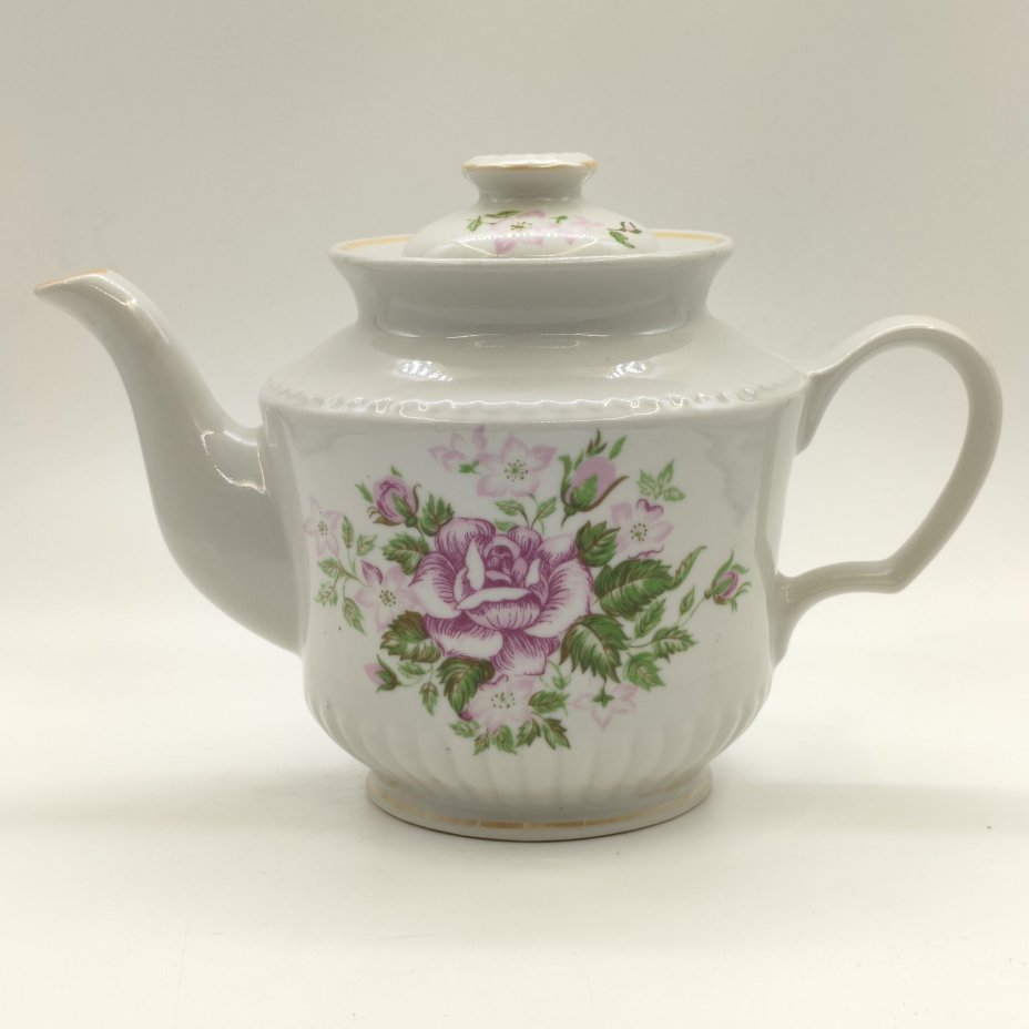 Чайник с цветочным декором и фигурной ручкой на крышке