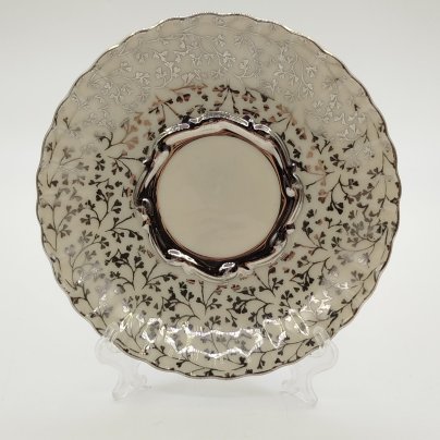 Блюдце кофейное, украшенное растительным декором