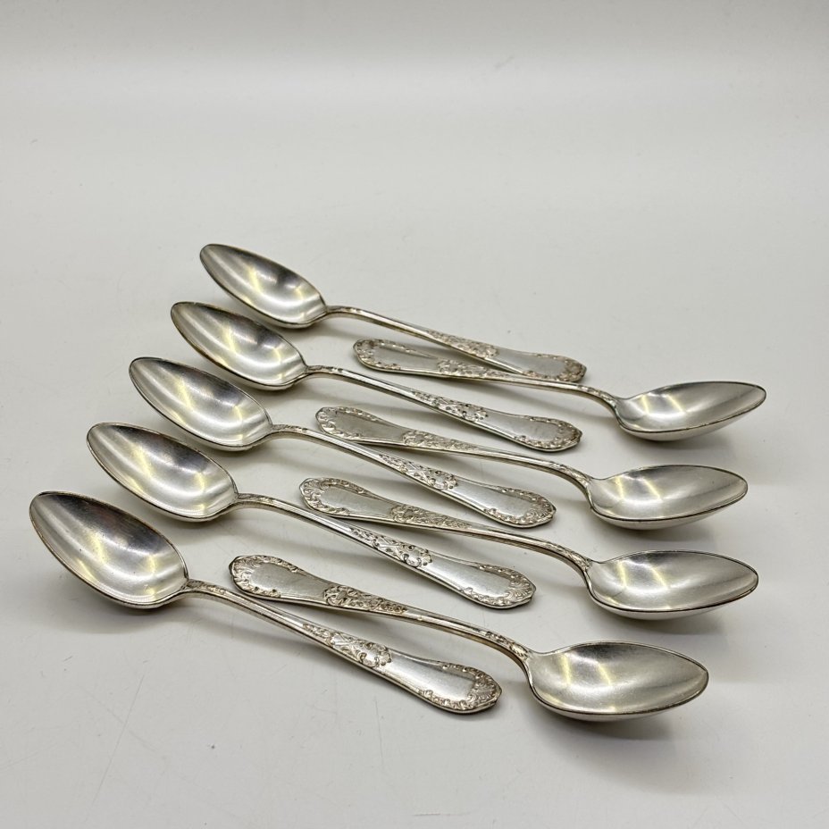 Набор из девяти чайных ложек с растительным декором, металл, серебрение, Fraget (Фабрика серебряных и плакированных изделий Иосифа Фраже), Царство Польское, 1890-1917 гг.