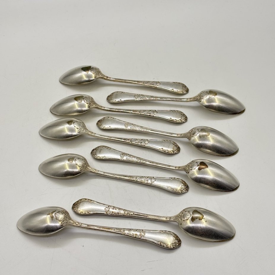 Набор из девяти чайных ложек с растительным декором, металл, серебрение, Fraget (Фабрика серебряных и плакированных изделий Иосифа Фраже), Царство Польское, 1890-1917 гг.