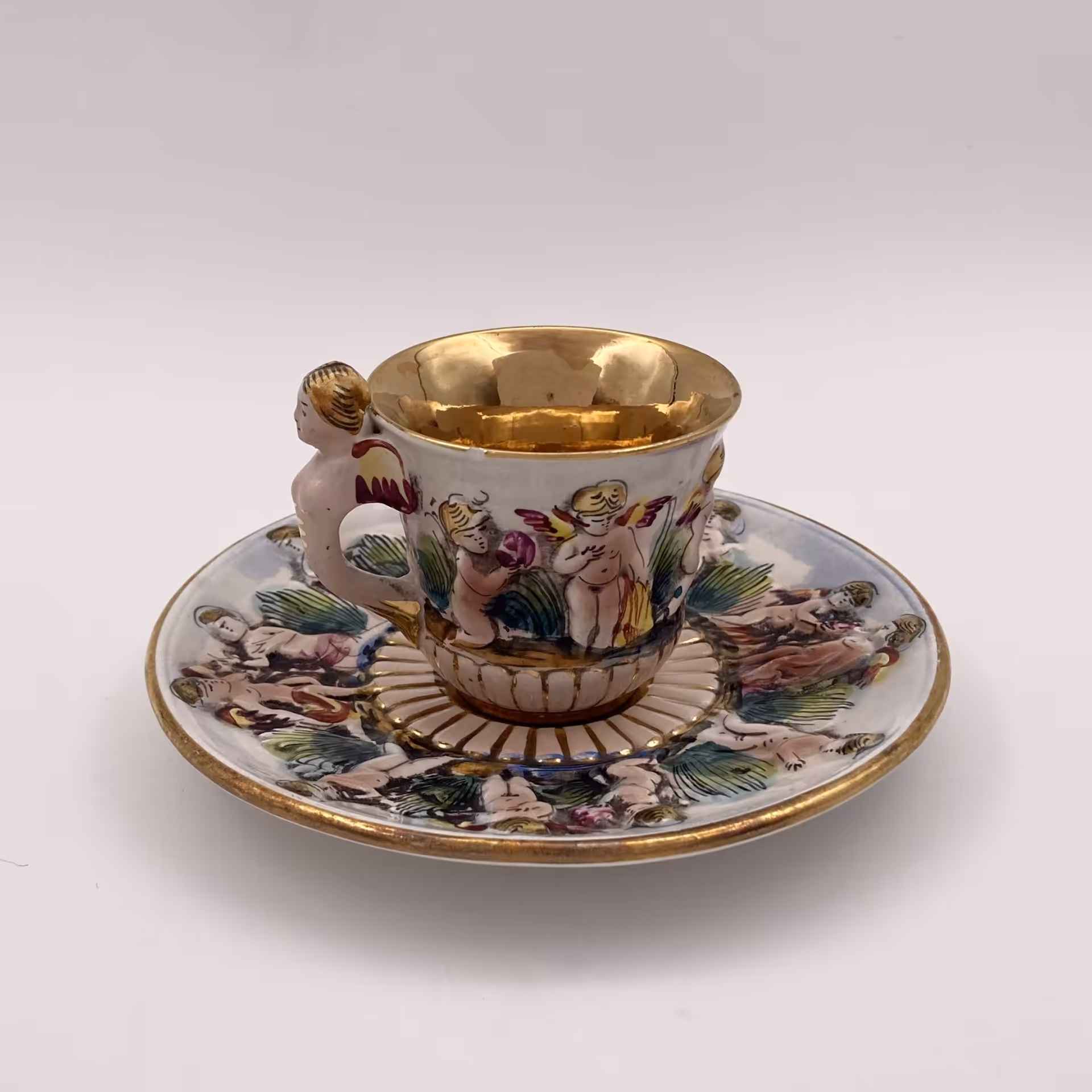 Кофейная пара с рельефным изображением Путти (модель 745), Capodimonte (Каподимонте)
