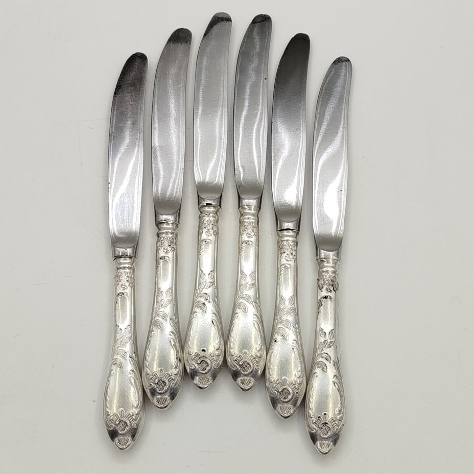 Набор из шести десертных ножей с растительным декором, мНЦ (медь-никель-цинк), сталь, Вольнянский завод столовых приборов им. Шевченко (ЗiШ, ЗиШ), СССР, 1960-1990 гг.