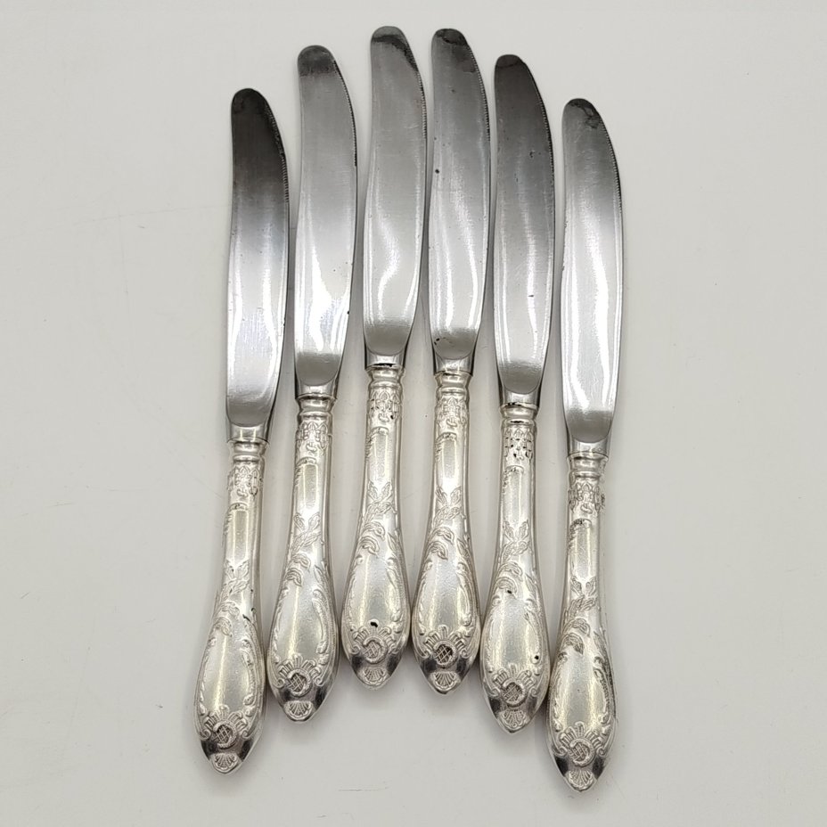 Набор из шести десертных ножей с растительным декором, мНЦ (медь-никель-цинк), сталь, Вольнянский завод столовых приборов им. Шевченко (ЗiШ, ЗиШ), СССР, 1960-1990 гг.