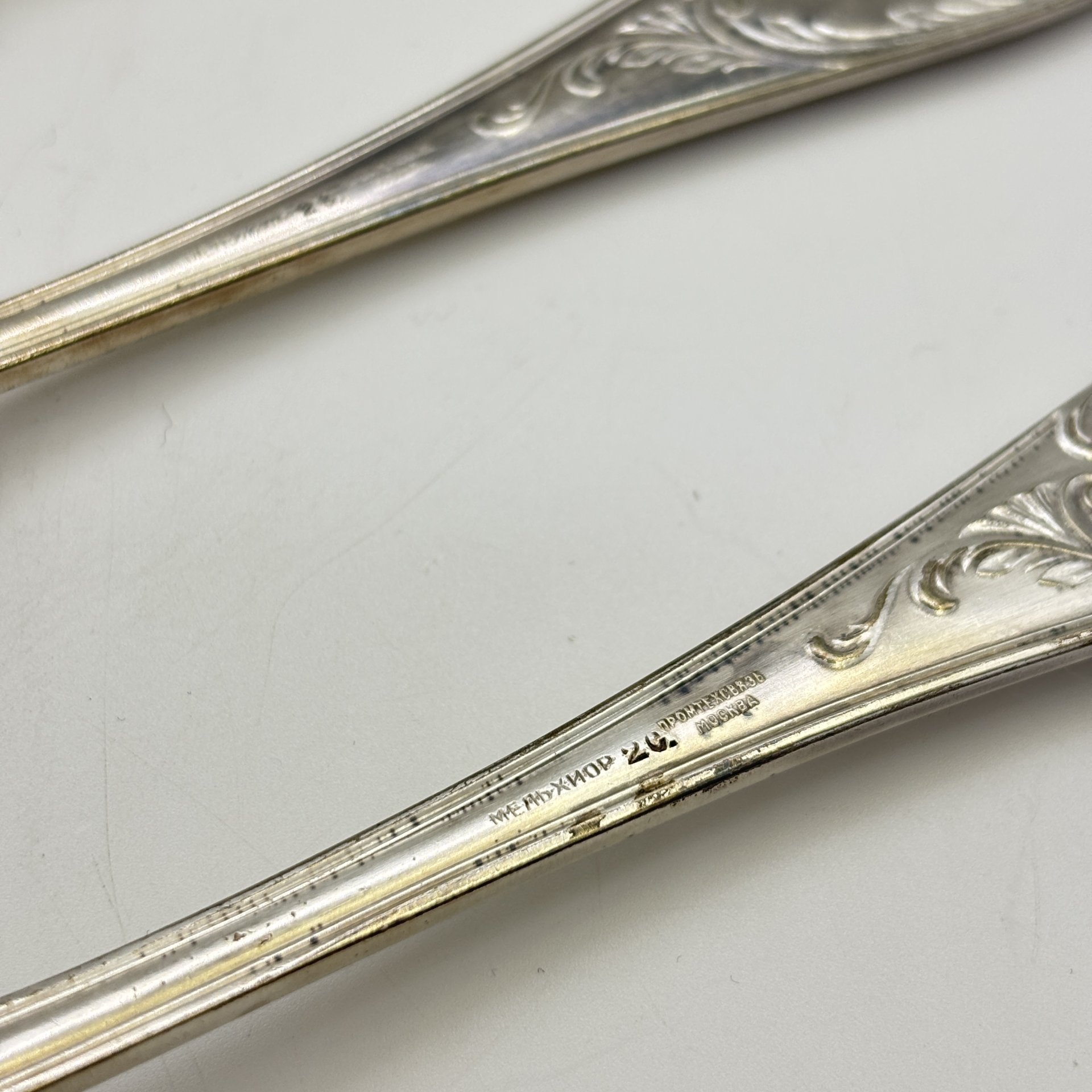 Набор из 6-ти столовых ложек, украшенных растительным декором, мельхиор (медь-никель), Артель «Промтехсвязь», СССР, 1947-1950 гг.