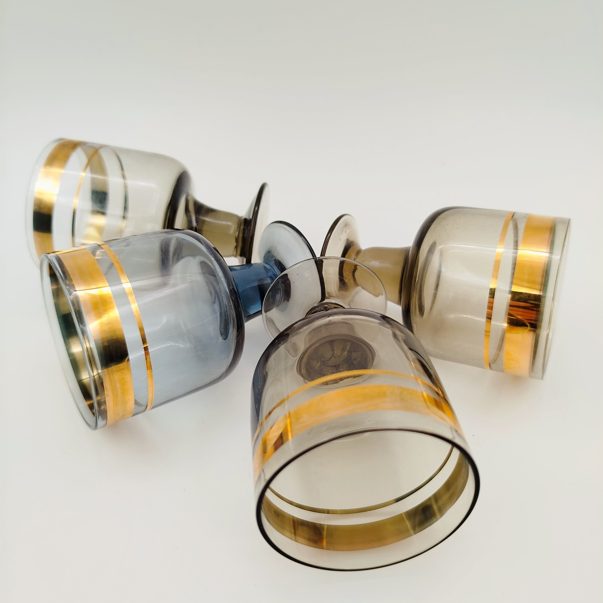 Набор из 4 ликерных рюмок (в подборе), цветное стекло, золочение, СССР, 1970-1990 гг.