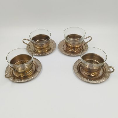 Набор из четырех чайно-кофейных пар (блюдца и подстаканники со стаканами), металл, стекло, СССР, 1970-1990 гг.