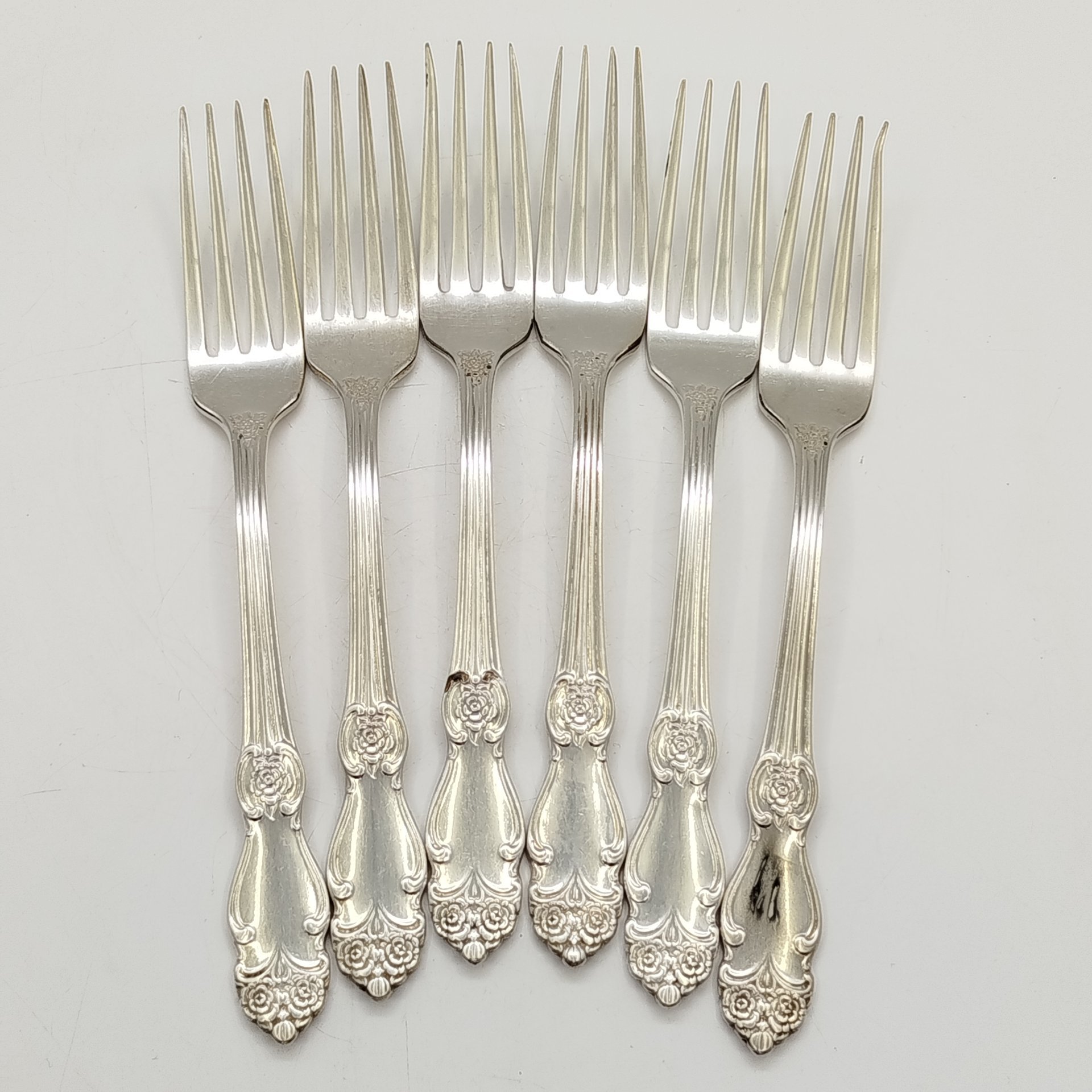 Набор из 6-ти столовых вилок с растительным декором, мНЦ (медь-никель-цинк), Кольчугинский завод цветных металлов, СССР, 1960-1980 гг.