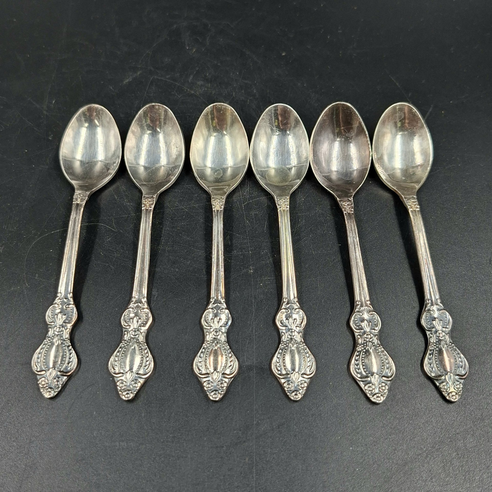 Набор из шести кофейных ложек с растительным декором, мНЦ (медь-никель-цинк), Режевский механический завод (РМ), СССР, 1970-1990 гг.