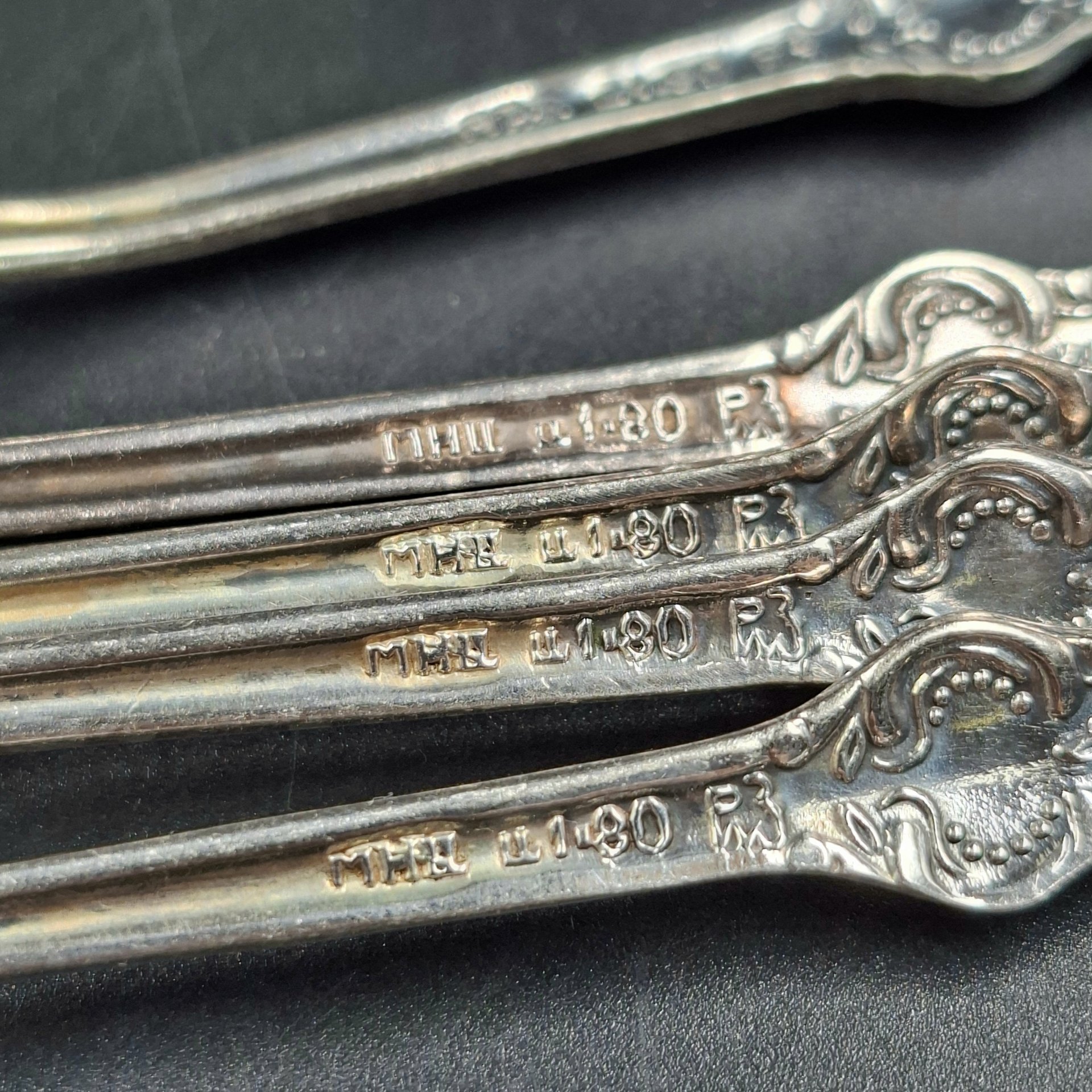 Набор из шести кофейных ложек с растительным декором, мНЦ (медь-никель-цинк), Режевский механический завод (РМ), СССР, 1970-1990 гг.