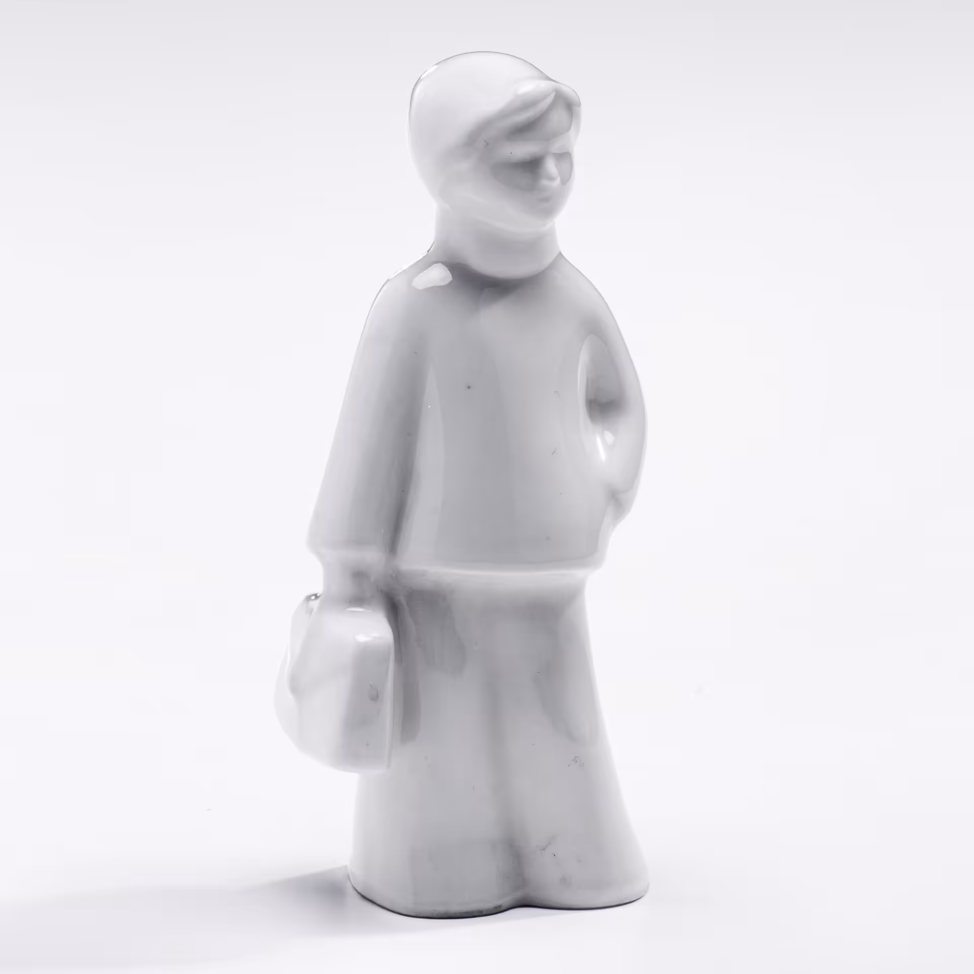 Статуэтка "Девочка с портфелем", фарфор, гразурь, СССР, 1960-1990 гг.