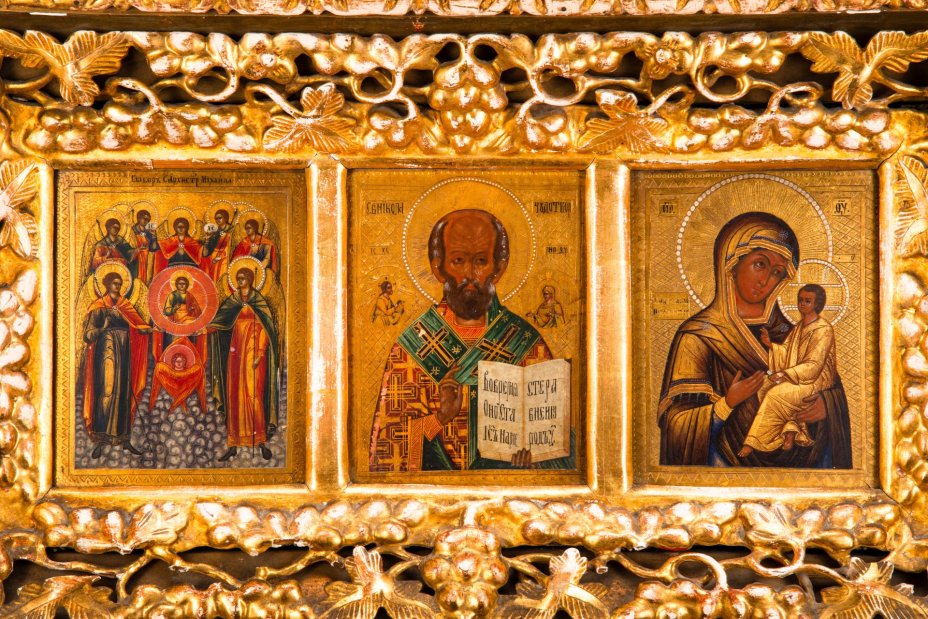 Икона-триптих составная: "Собор Архистратига Михаила", "Св. Николай Чудотворец" и "Тихвинская икона Божией Матери", в киоте с растительным декором