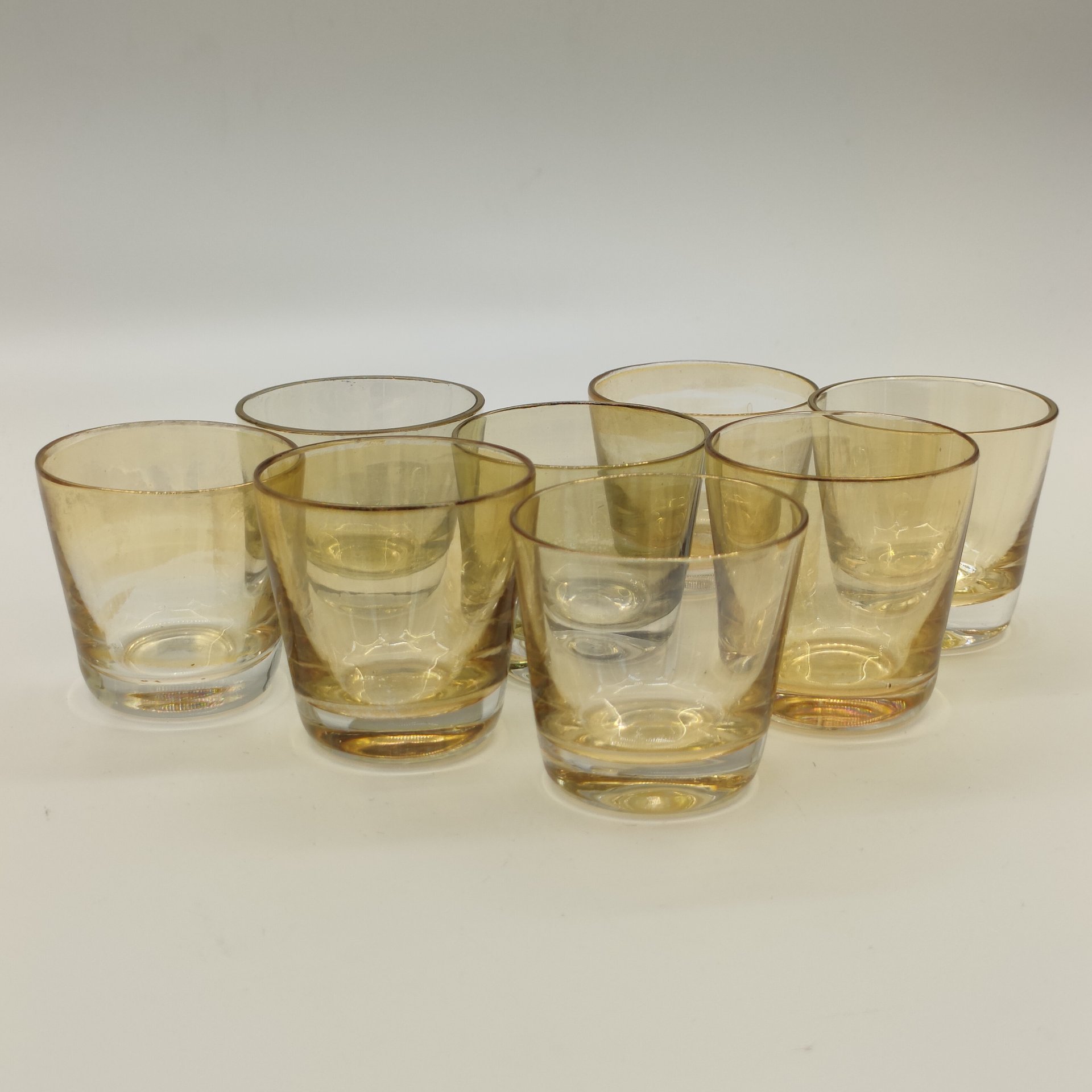 Набор стопок желтого оттенка на 8 персон, цветное стекло, золочение, СССР, 1970-1990 гг.