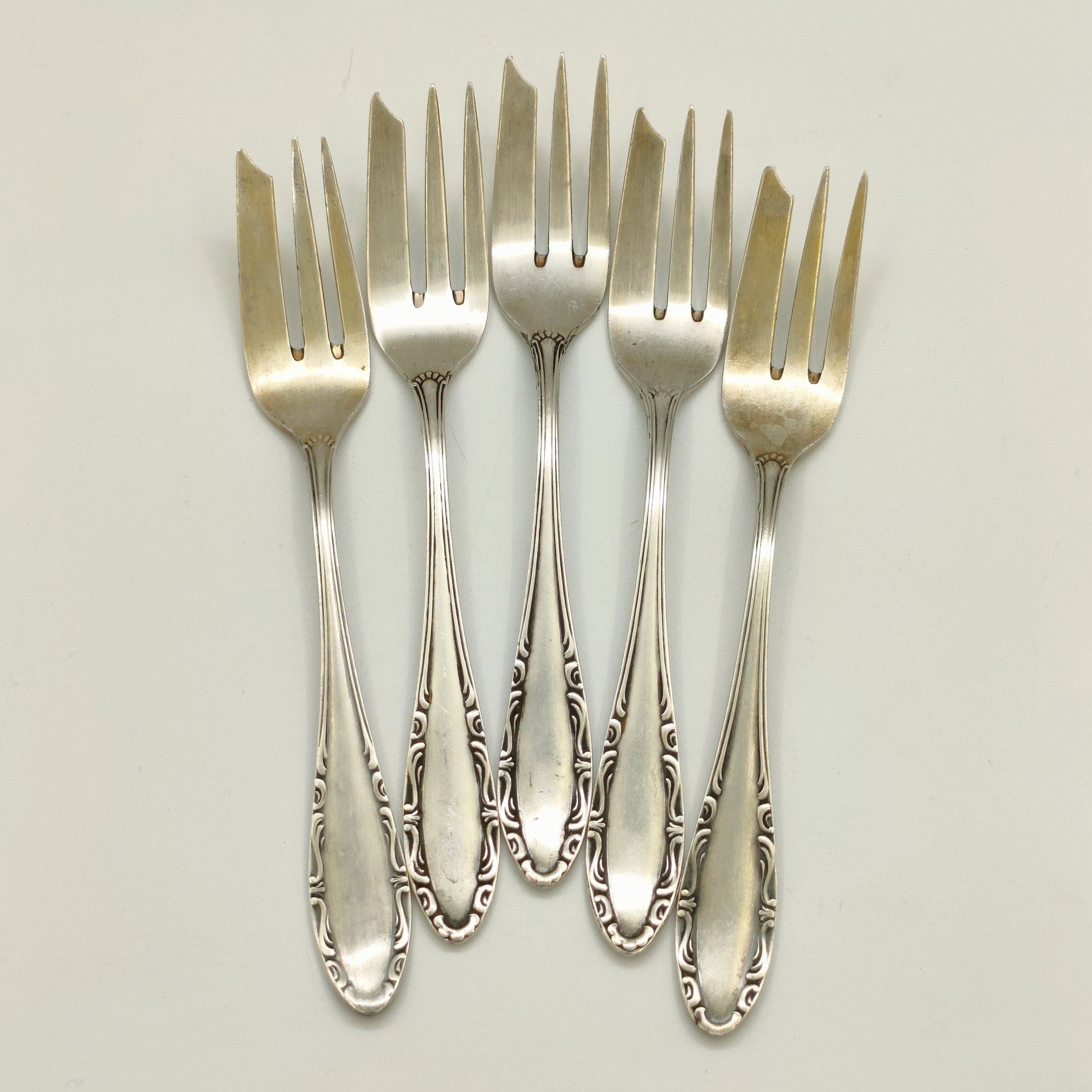 Набор из 5-ти десертных вилок с тремя зубцами лаконичной формы, сталь, Германия, 1920-1960 гг.