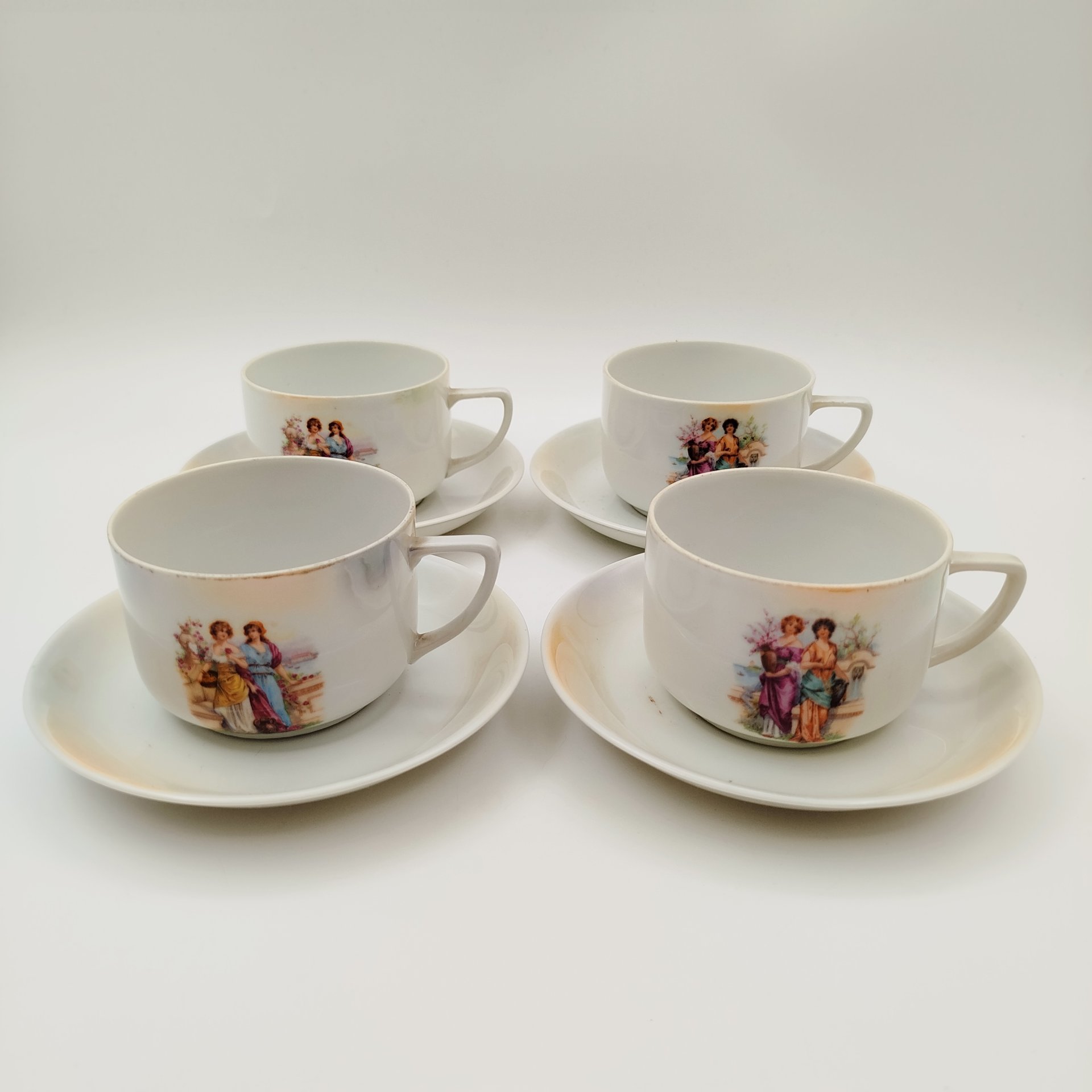 Набор чайно-кофейных пар с изображением девушек в саду на 4 персоны, фарфор, деколь, Victoria, Чехословакия, 1918-1939 гг.