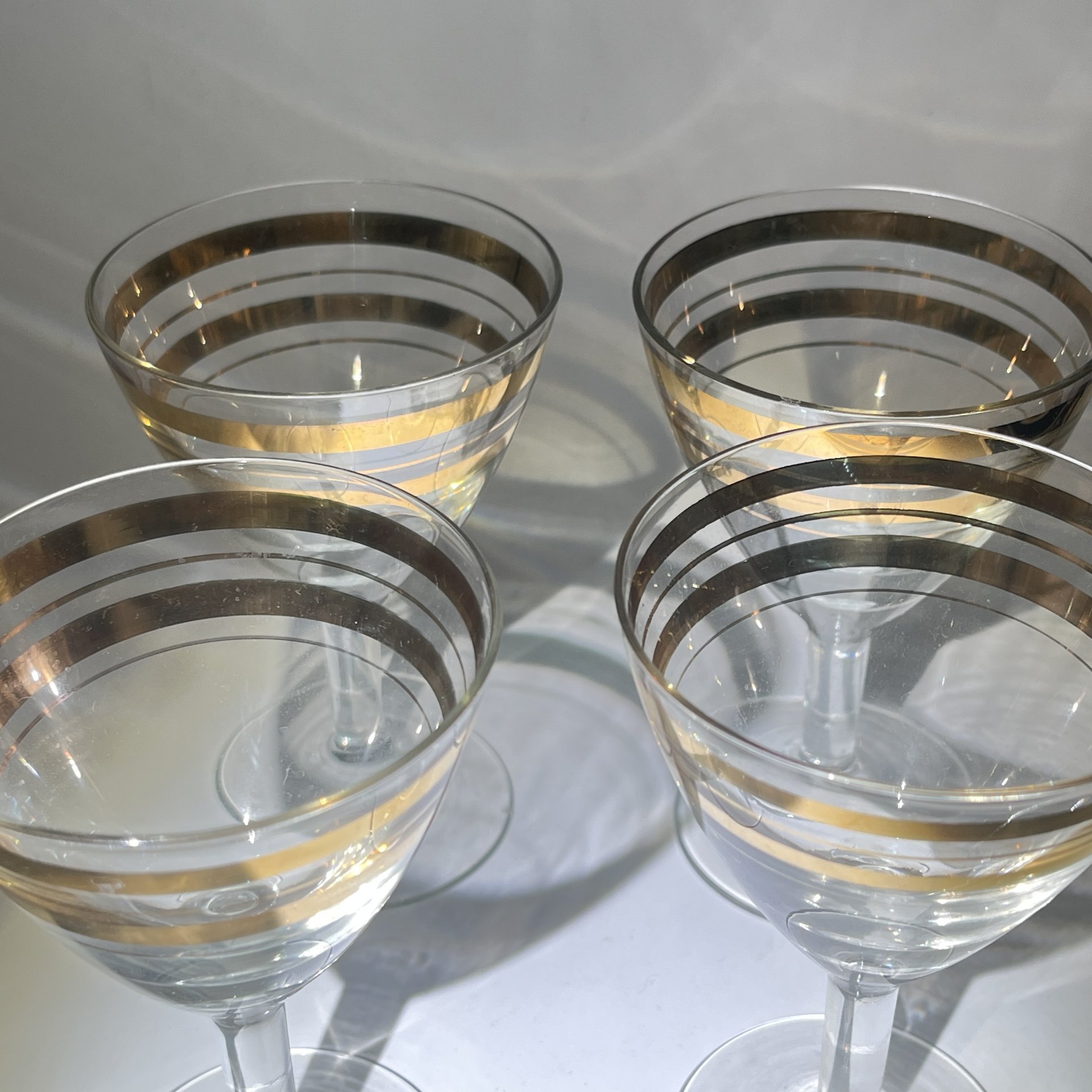 Набор из 4 рюмок с декором в виде золотых полос, стекло, золочение, СССР, 1970-1990 гг.
