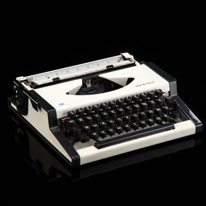 Машинка печатная "Unis TBM De Luxe" с корпусом белого цвета, в оригинальном футляре и коробке, металл, пластик, Tvornica Biro Mašina, Югославия, 1970-1990 гг.