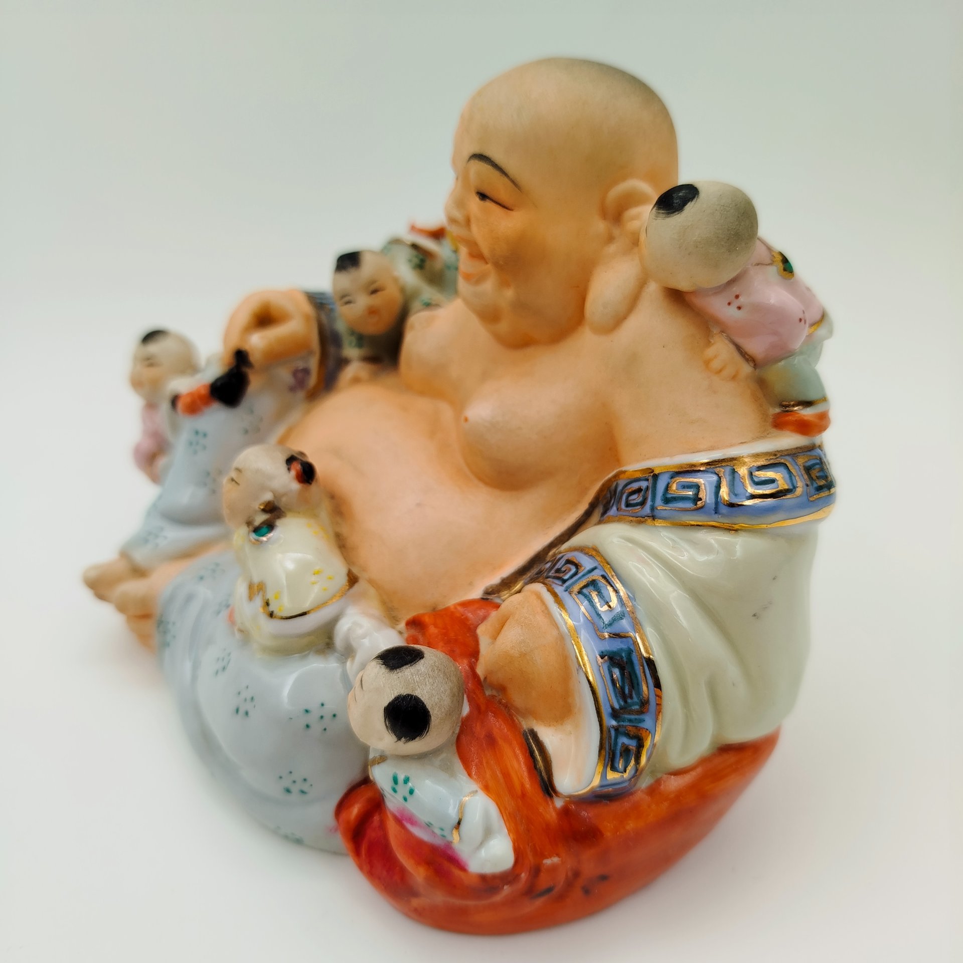 Статуэтка "Хотей с карако" (божество счастья), фарфор, бисквит, роспись, золочение, Китай, 1960-1980 гг.