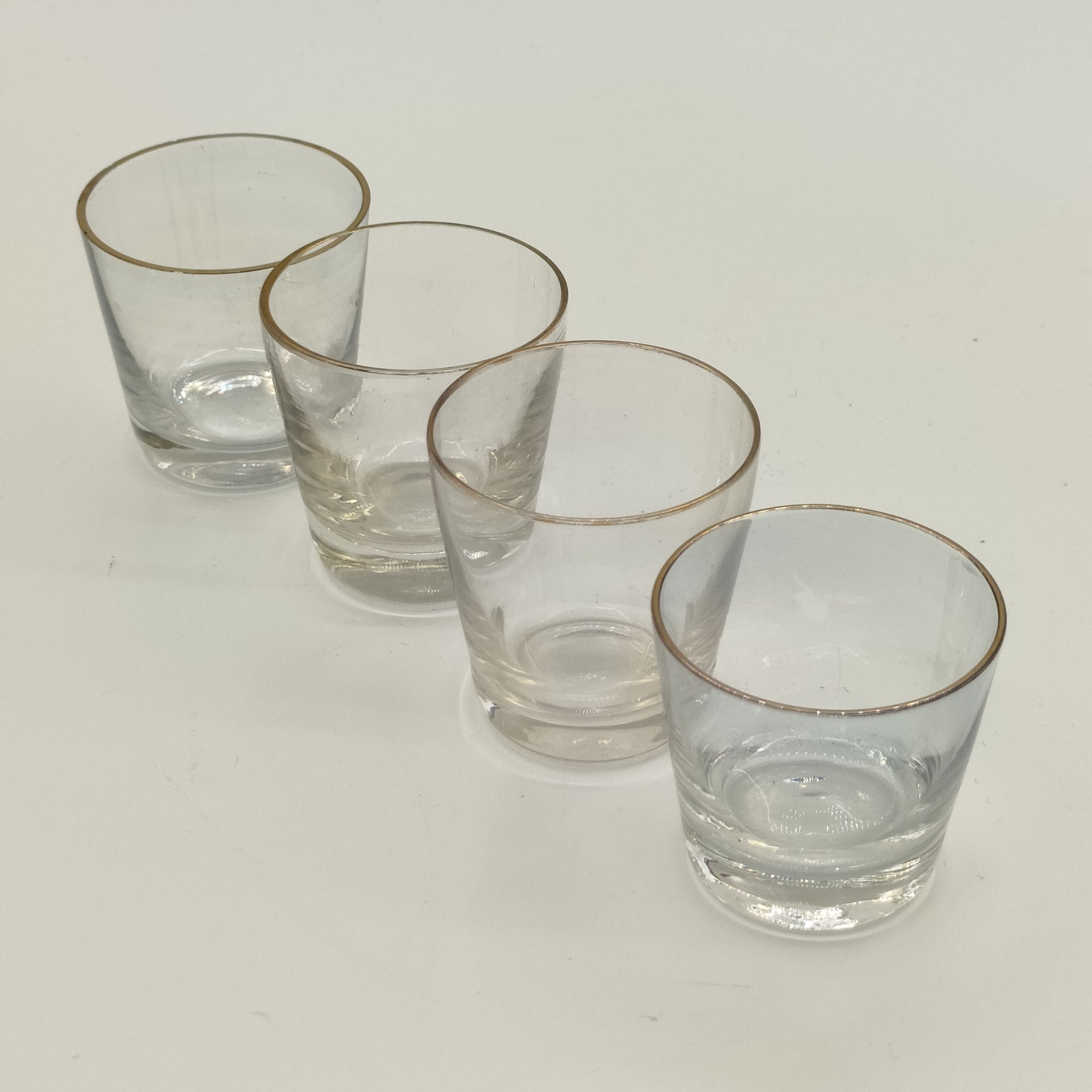 Набор из 4-х стопок лаконичной формы для крепких напитков, стекло, золочение, СССР, 1970-1990 гг.