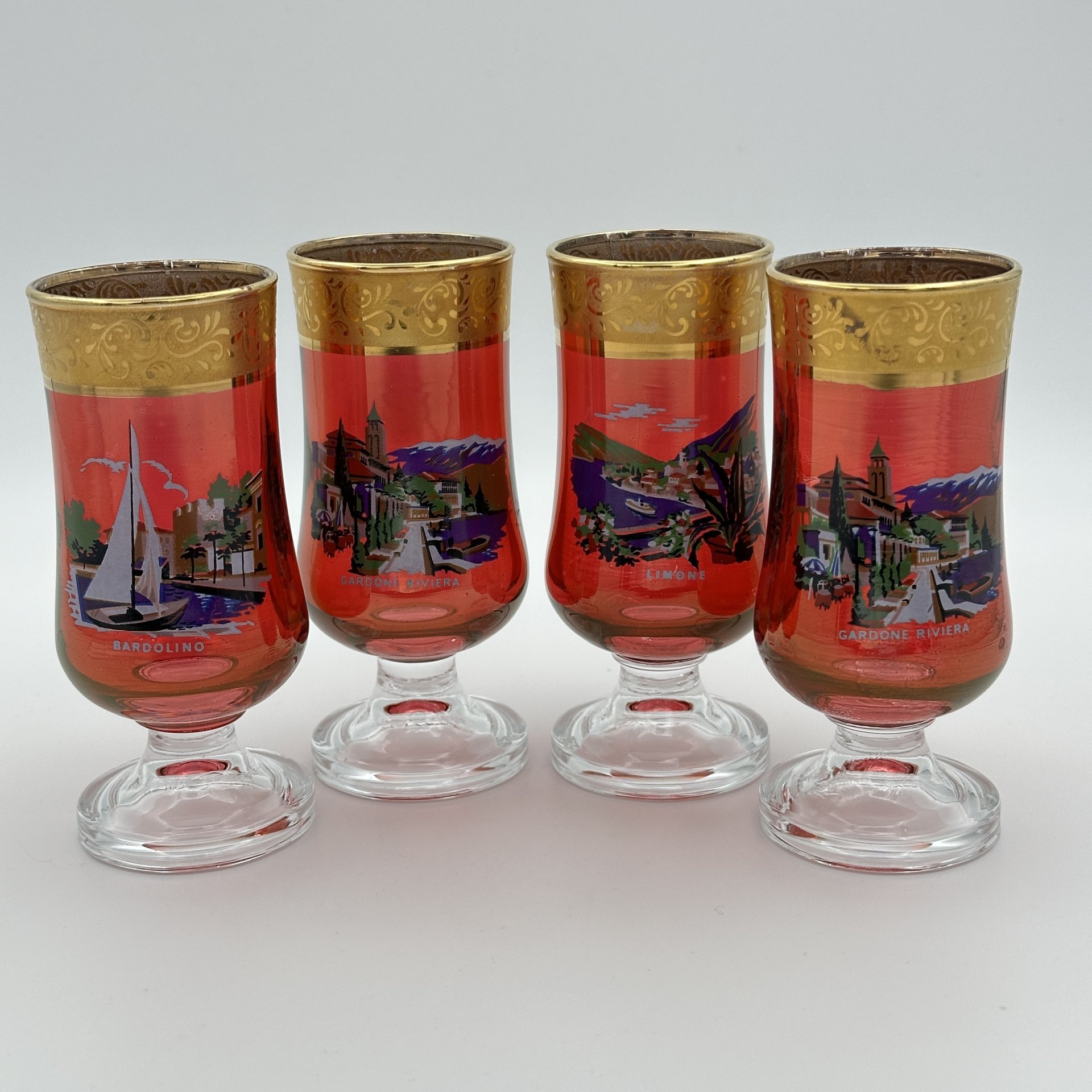 Набор рюмок на ножке с изображением коммун в Италии, цветное стекло, золочение, деколь, Италия, 1980-2000 гг.