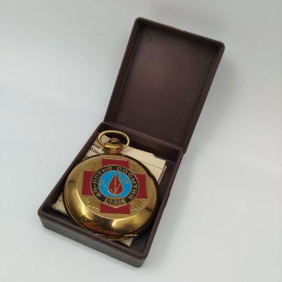 Часы карманные "10-летие событий ЧАЭС" в коробке с гаранитийным таллоном, металл, стекло, пластик, бумага, Челябинский часовой завод «Молния», Российская Федерация, 1996 г.