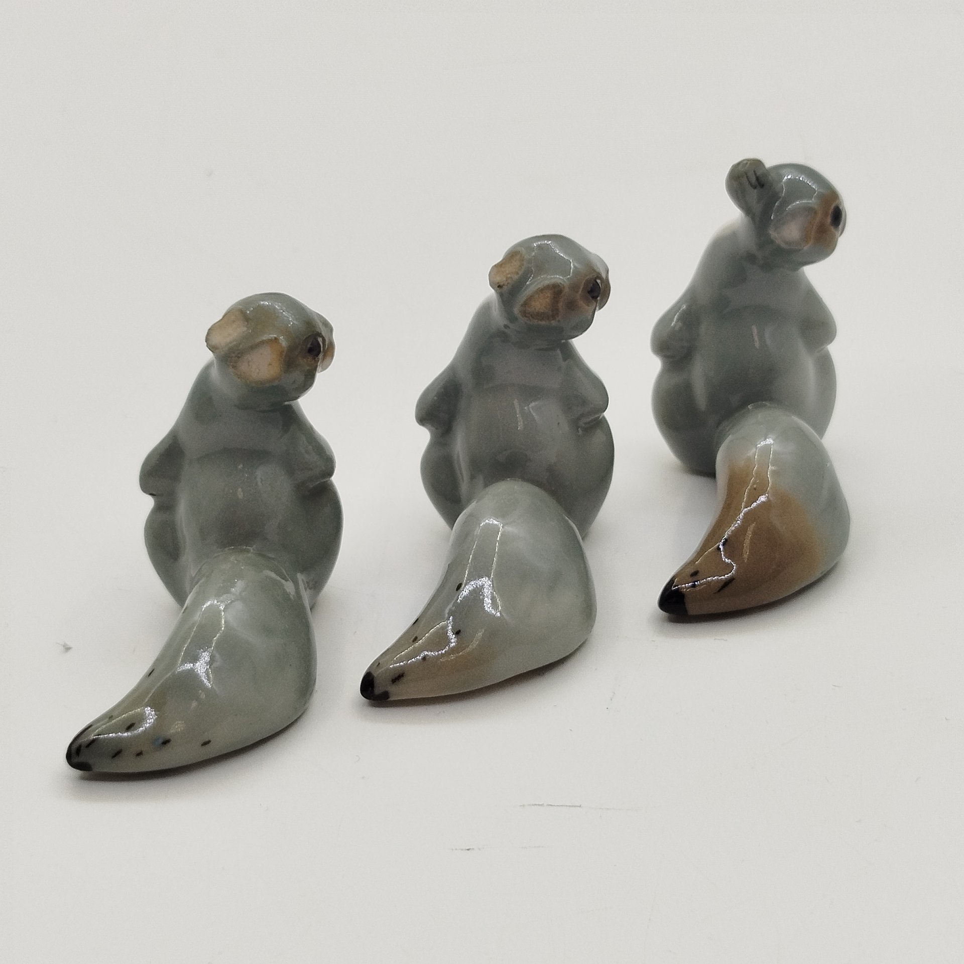 Набор из 3-х статуэток "Белочка" (под реставрацию), скульптор Н.Е. Муратов, фарфор, роспись, Ленинградский фарфоровый завод (ЛФЗ), СССР, 1950-1980 гг.