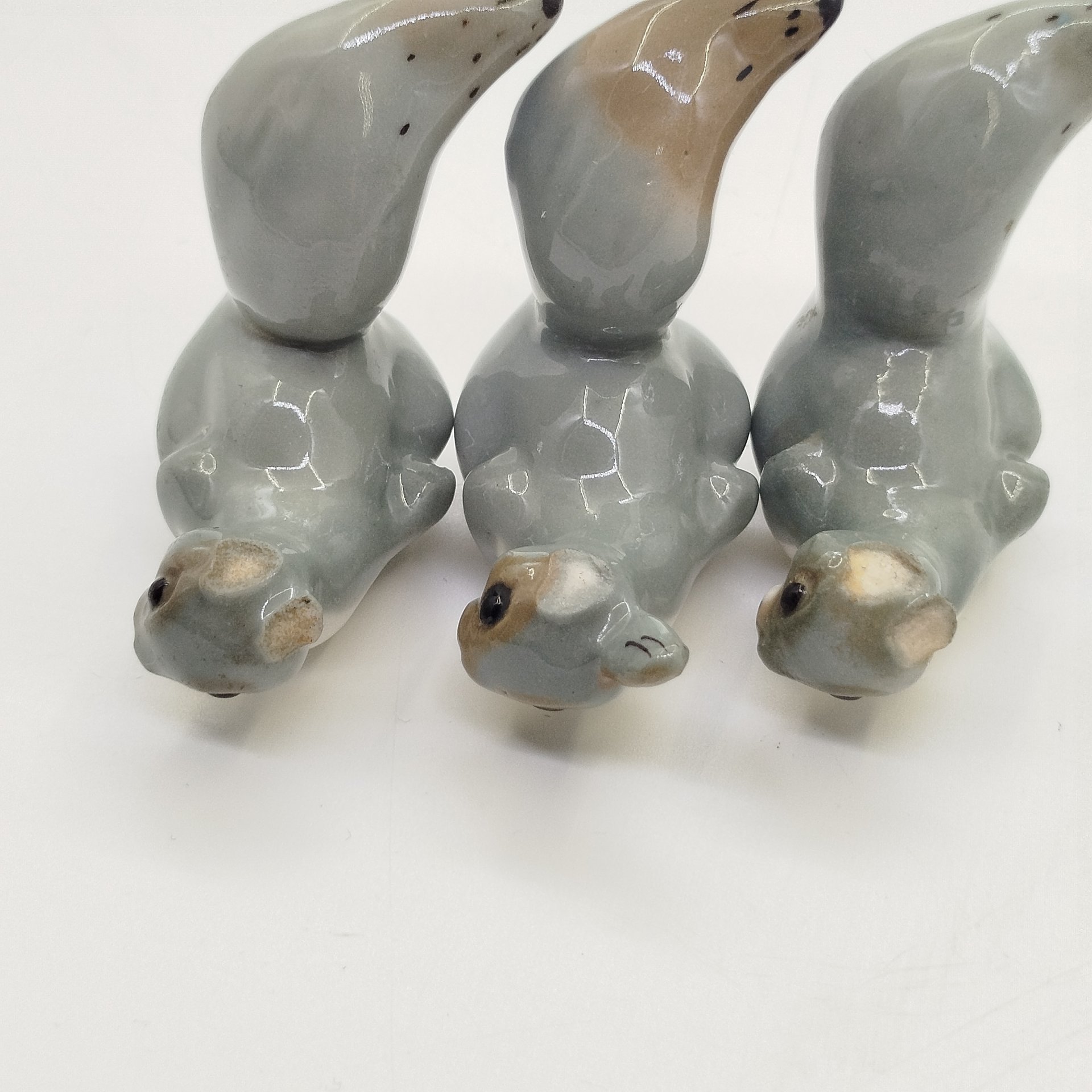 Набор из 3-х статуэток "Белочка" (под реставрацию), скульптор Н.Е. Муратов, фарфор, роспись, Ленинградский фарфоровый завод (ЛФЗ), СССР, 1950-1980 гг.