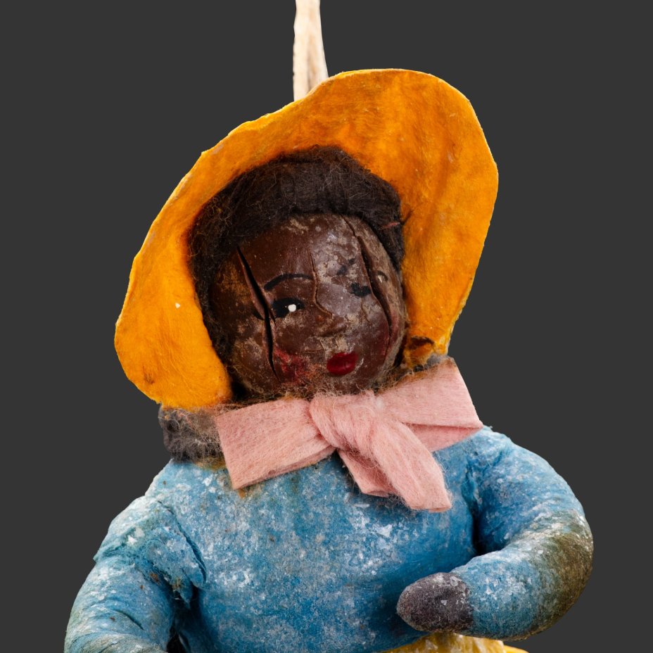 Елочная игрушка "Девочка-негритянка в желтой шляпке"