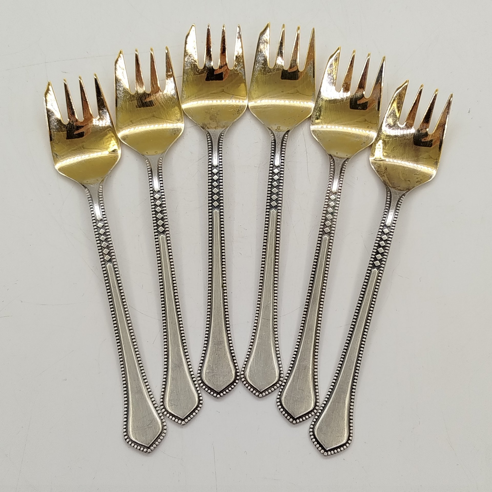 Набор вилок для десерта на 6 персон, мНЦ (медь-никель-цинк), золочение, Таллинский ювелирный завод, СССР, 1970-1990 гг.