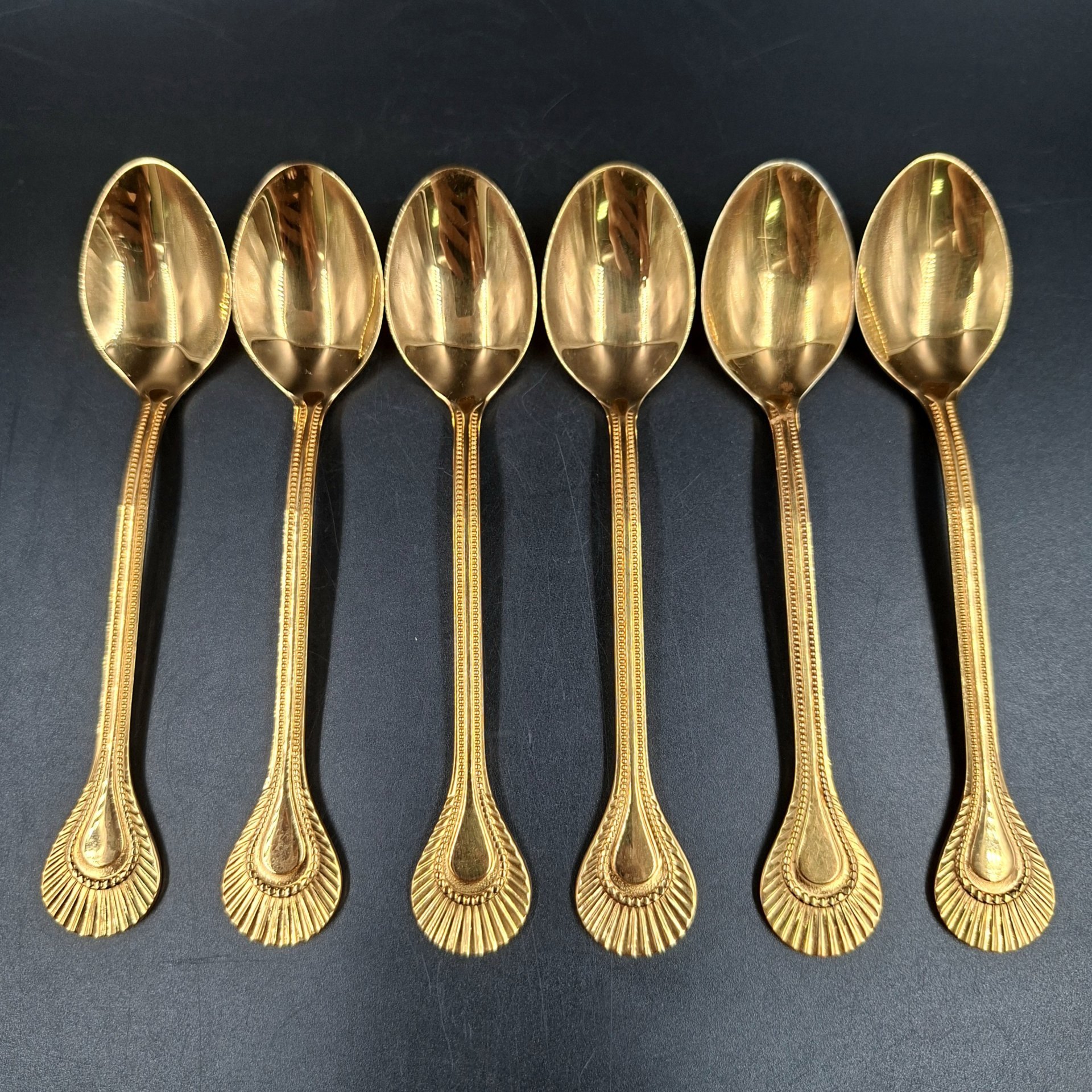 Набор из шести чайных ложек с фигурными черенками, металл, золочение, Таллинский ювелирный завод, СССР, 1970-1990 гг.