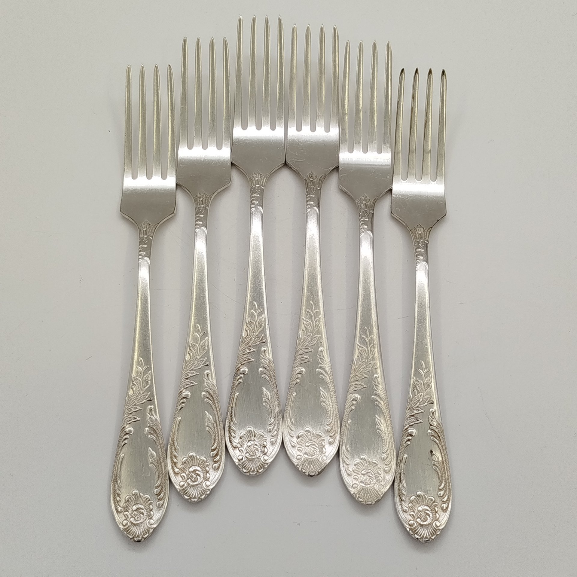 Набор вилок с растительным декором на черенках (6 шт.), мНЦ (медь-никель-цинк), Вольнянский завод столовых приборов им. Шевченко (ЗiШ, ЗиШ), СССР, 1970-1990 гг.