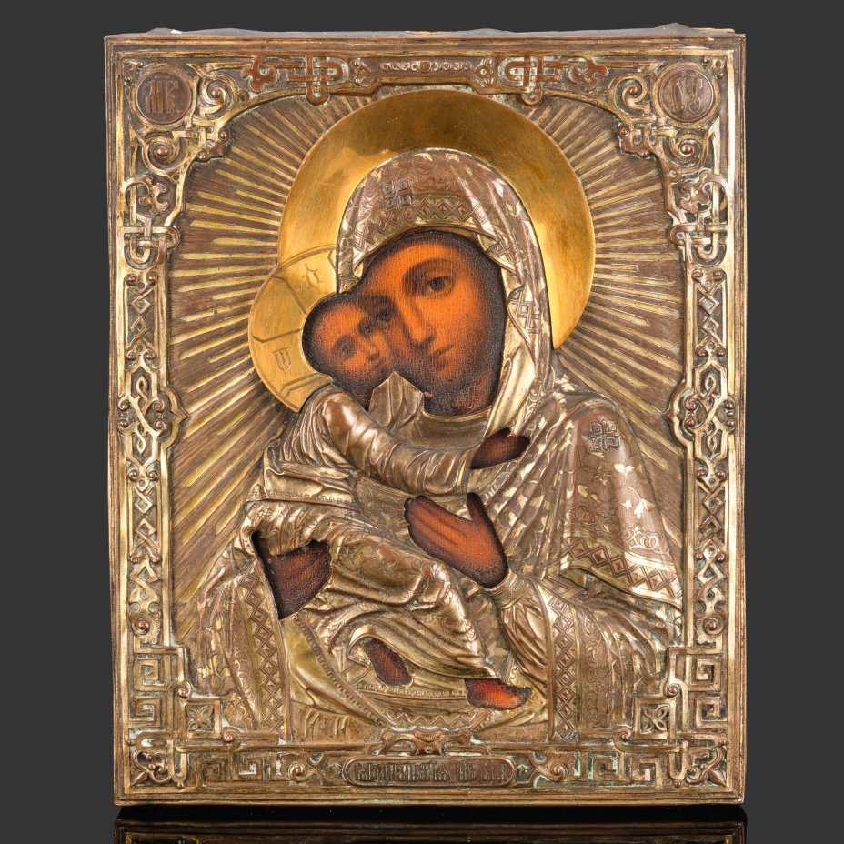 Икона "Богоматерь Владимирская" в окладе с орнаментальным декором, дерево, масло, латунь, чеканка, гравировка, ткань, Российская империя, 1880-1910 гг.