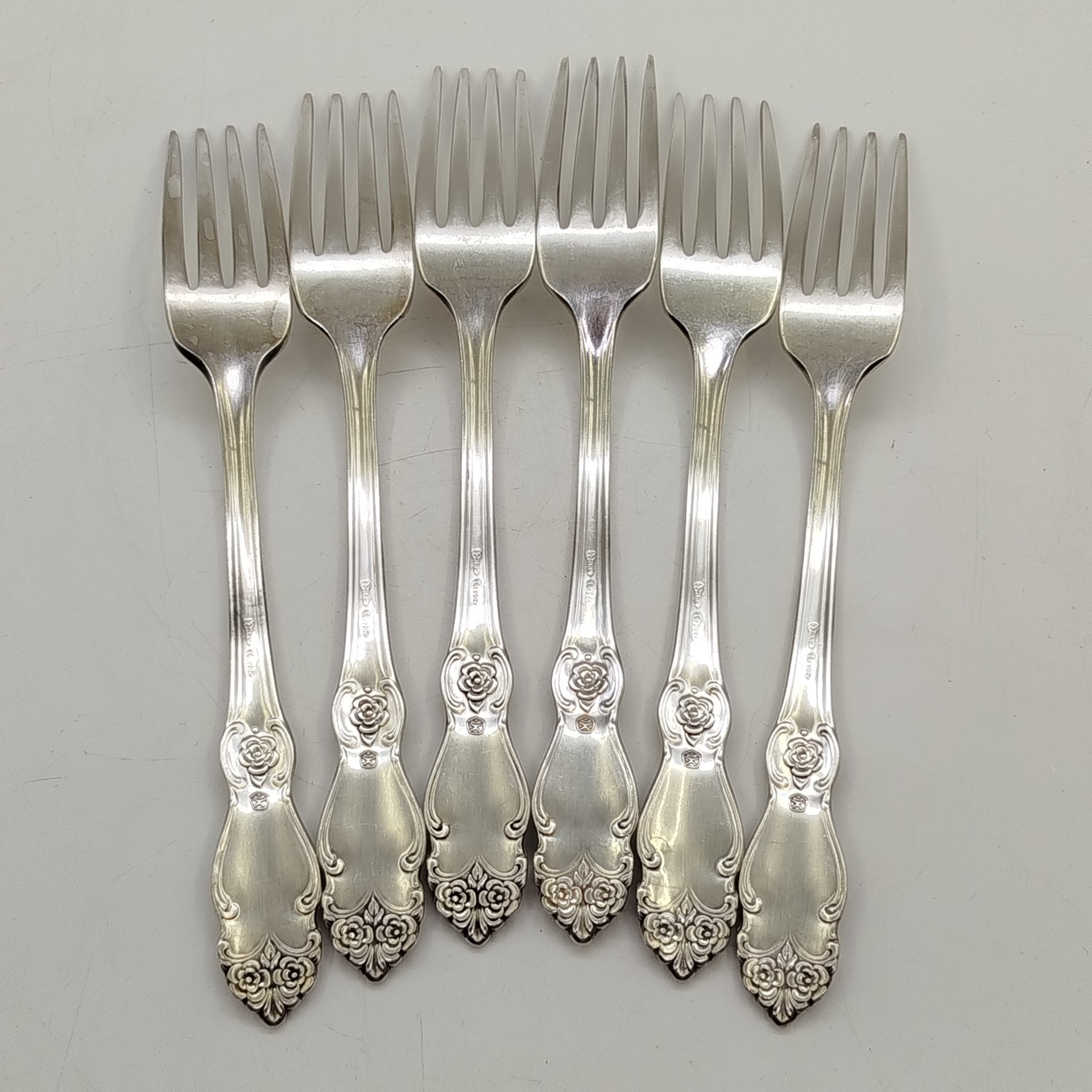 Набор из 6-ти столовых вилок "Серебряная роза", мНЦ (медь-никель-цинк), Кольчугинский завод цветных металлов, СССР, 1930-1950 гг.
