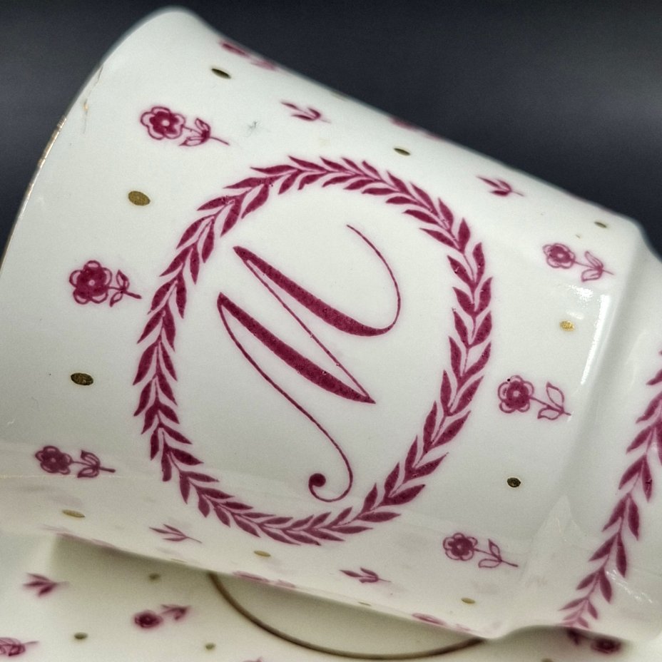 Трио кофейное с буквой "М" и нежным цветочным декором в пурпурной гамме, фарфор, деколь, золочение, Ленинградский фарфоровый завод (ЛФЗ), СССР, 1970-1992 гг.