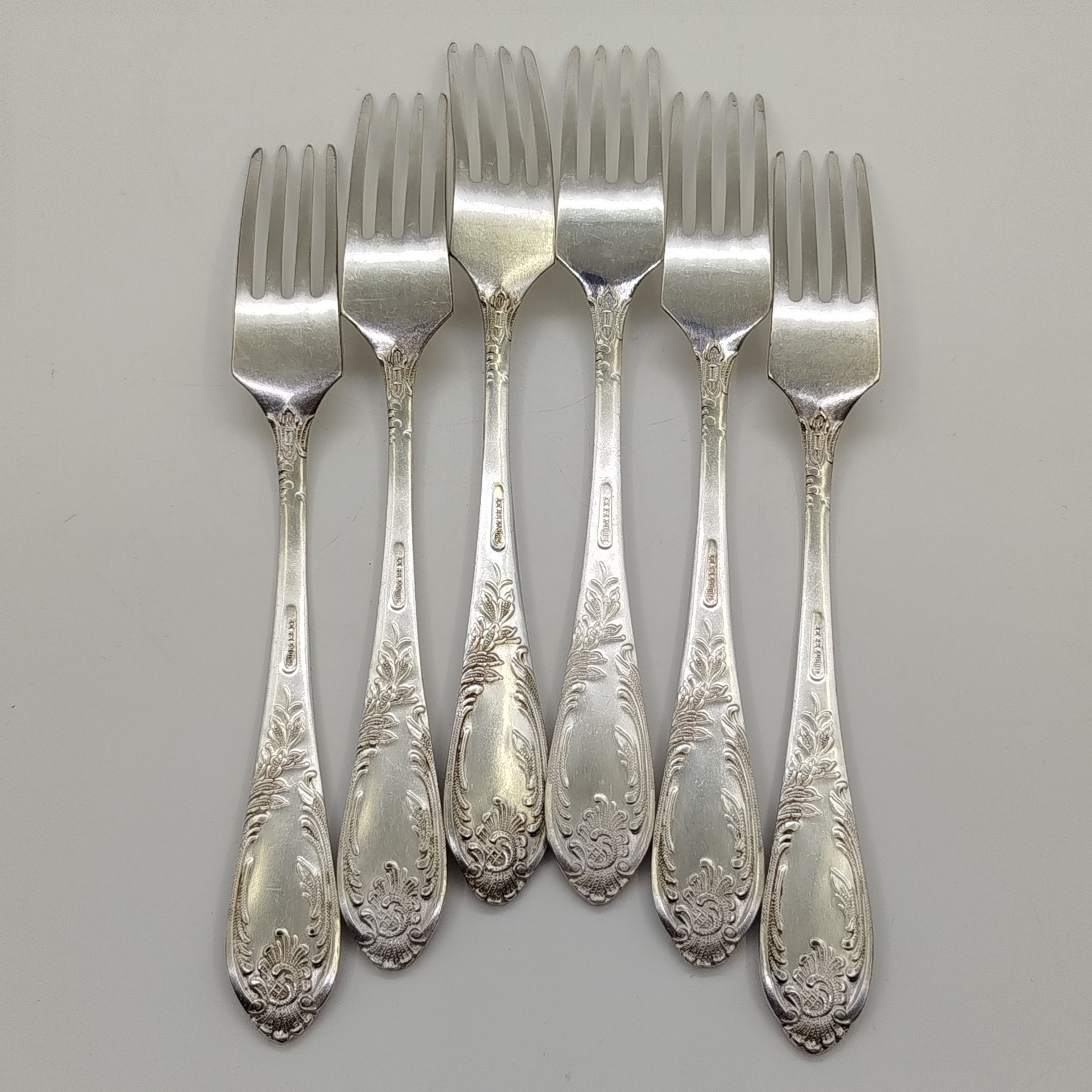 Набор вилок с растительным декором на черенках (6 шт.), мНЦ (медь-никель-цинк), Вольнянский завод столовых приборов им. Шевченко (ЗiШ, ЗиШ), СССР, 1970-1990 гг.