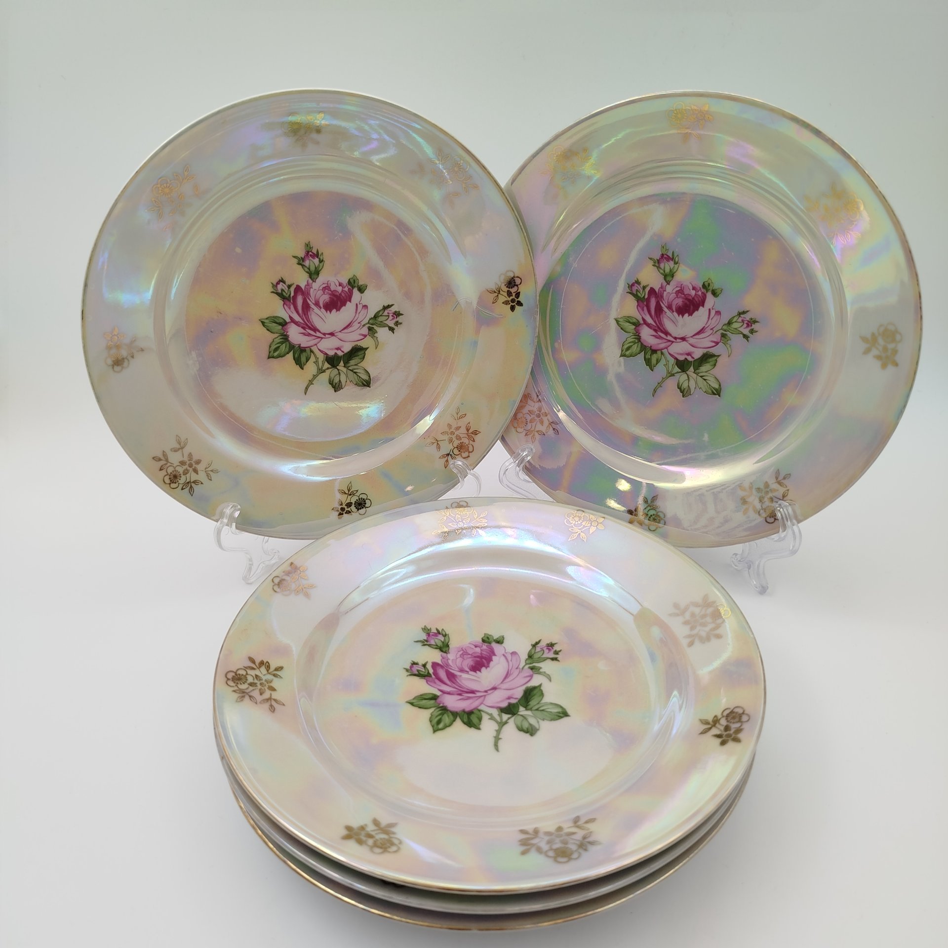 Набор из 5-ти тарелок, украшенных цветочным декором, фарфор, люстр, деколь, золочение, Kahla, ГДР, 1968-1987 гг.