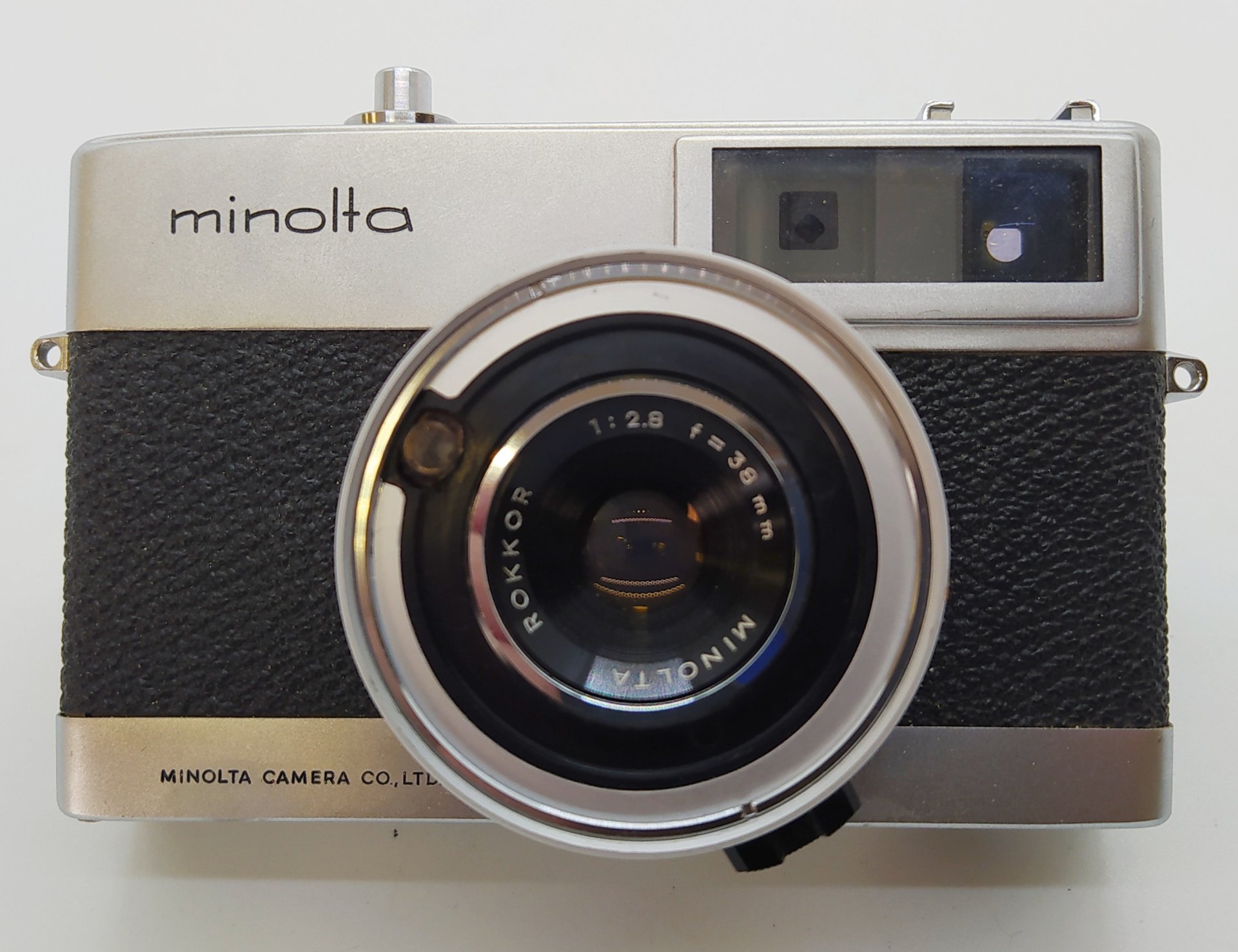 Фотоаппарат пленочный "Minolta Autopak 700" с объективом "Rokkor", металл, стекло, пластик, кожа, Minolta