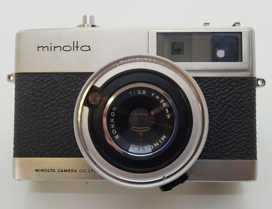 Фотоаппарат пленочный "Minolta Autopak 700" с объективом "Rokkor", металл, стекло, пластик, кожа, Minolta