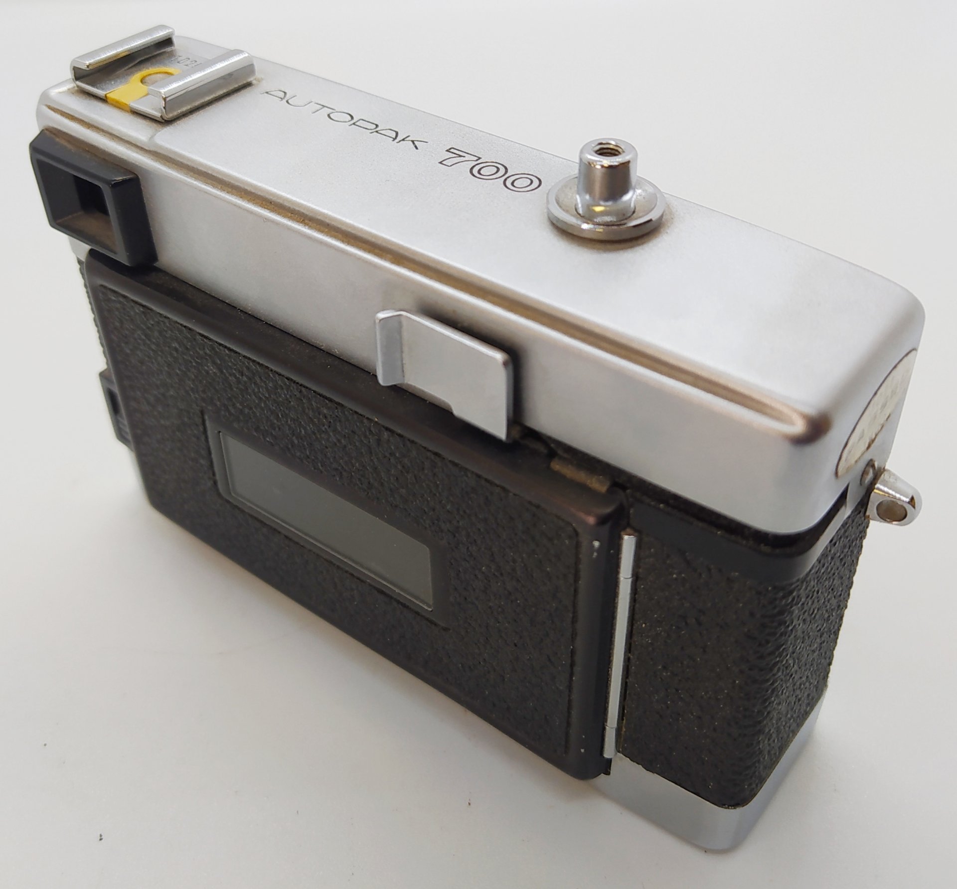 Фотоаппарат пленочный "Minolta Autopak 700" с объективом "Rokkor", металл, стекло, пластик, кожа, Minolta