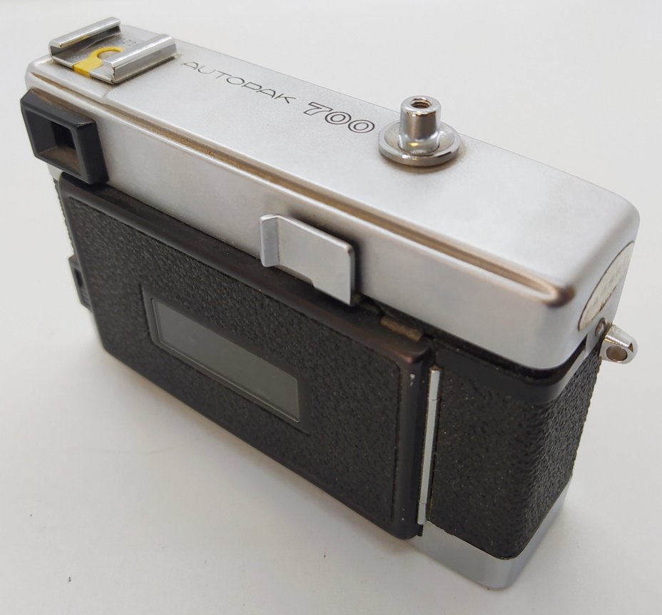 Фотоаппарат пленочный "Minolta Autopak 700" с объективом "Rokkor", металл, стекло, пластик, кожа, Minolta