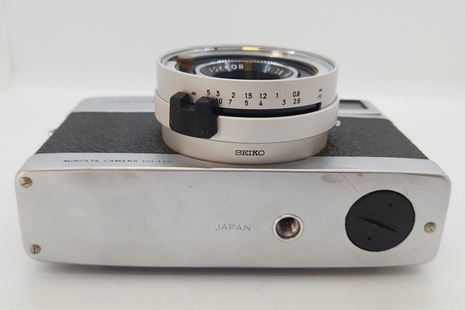 Фотоаппарат пленочный "Minolta Autopak 700" с объективом "Rokkor", металл, стекло, пластик, кожа, Minolta