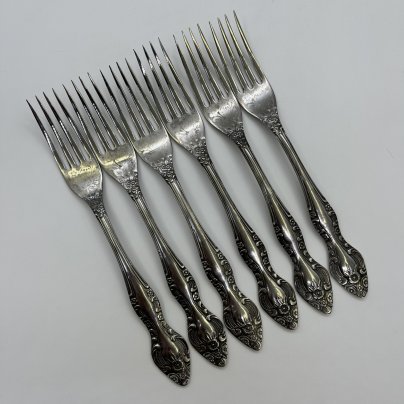 Набор из 6-ти столовых вилок, украшенных растительным декором, нержавеющая сталь, Павловский завод художественных металлоизделий им. С.М. Кирова, СССР, 1970-1990 гг.