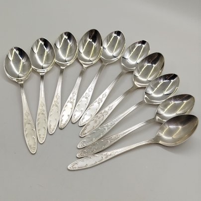 Набор из десяти десертных ложек "Пламя", мНЦ (медь-никель-цинк), Кольчугинский завод цветных металлов, СССР, 1960-1990 гг.